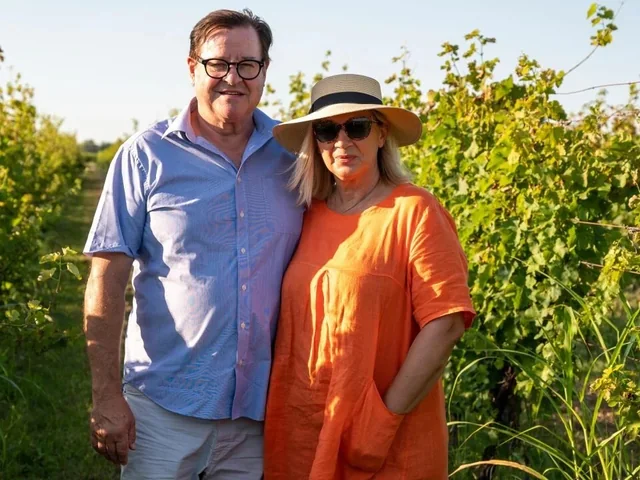 Don McCulloch and Seka Nikolić standing in the vineyard